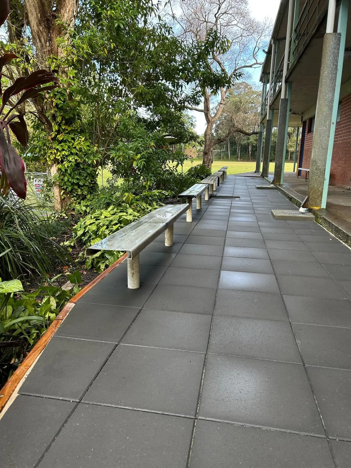 Paved walkway and garden beds through the Bellingen High School grounds