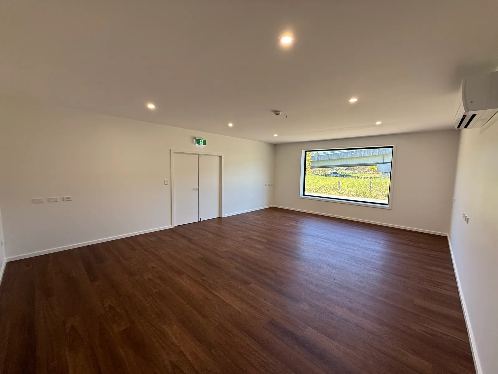 Large open office space at the works depot with double doors, downlights and a picture window, Macksville