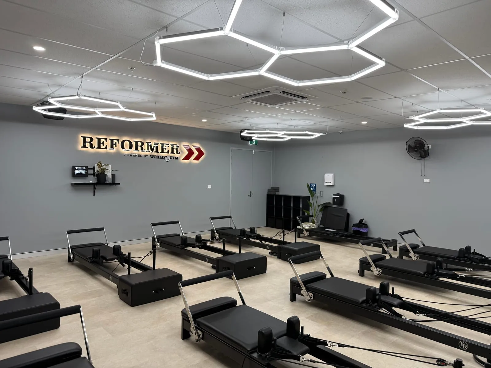 Completed reformer studio fit-out at World Gym Coffs Harbour, ready for classes